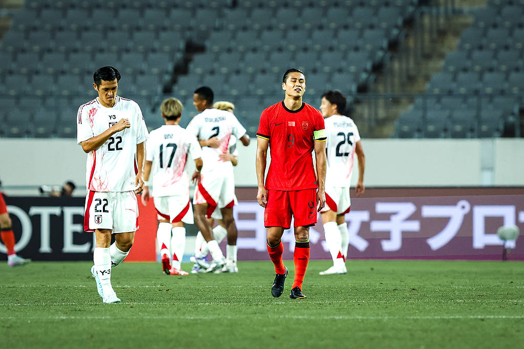 韩国足球联赛_东亚杯-张玉宁失单刀 国足0-2不敌日本遭两连败