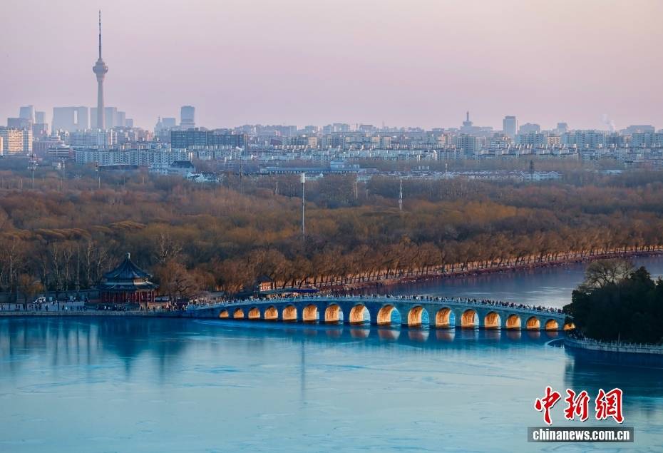 皇冠信用盘在线申请_北京颐和园呈现“金光穿洞”景观